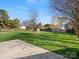 Expansive, well-maintained backyard with a wooden fence and a concrete patio at 2020 Holly Villa Cir, Indian Trail, NC 28079