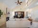 A living room featuring a cathedral ceiling, a fireplace, and comfortable furniture at 2020 Holly Villa Cir, Indian Trail, NC 28079