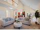 Spacious living room with comfortable seating, open to dining area, features abundant natural light at 2020 Holly Villa Cir, Indian Trail, NC 28079