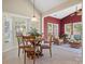 A sun room features lots of windows and casual furniture at 2020 Holly Villa Cir, Indian Trail, NC 28079