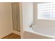This bathroom has a large soaking tub and a glass shower enclosure at 212 Mary Caroline Springs Dr, Mount Holly, NC 28120