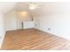 Large bonus room with plenty of light and wood flooring at 212 Mary Caroline Springs Dr, Mount Holly, NC 28120