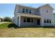 Exterior of a two-story home featuring a covered patio at 2204 Camber Dr # Cwo0076, Gastonia, NC 28054