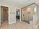 Elegant bathroom featuring frameless glass shower and access to the walk-in closet at 2204 Camber Dr # Cwo0076, Gastonia, NC 28054