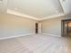 Spacious bedroom features plush carpeting, tray ceiling, and access to ensuite bathroom at 2204 Camber Dr # Cwo0076, Gastonia, NC 28054