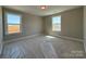 Bright bedroom with two windows offering plenty of natural light and neutral walls and new carpet at 2204 Camber Dr # Cwo0076, Gastonia, NC 28054