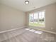 Neutral bedroom with plush carpet and window offering an abundance of natural light at 2204 Camber Dr # Cwo0076, Gastonia, NC 28054