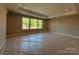Bright bedroom with tray ceilings and a large window offering scenic views at 2204 Camber Dr # Cwo0076, Gastonia, NC 28054