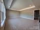 Large bedroom featuring tray ceilings and a large window offering natural light at 2204 Camber Dr # Cwo0076, Gastonia, NC 28054