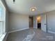 Bedroom featuring neutral walls, new carpet, recessed lighting and a view to an en-suite bathroom at 2204 Camber Dr # Cwo0076, Gastonia, NC 28054