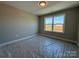 Bedroom with great light exposure showing new construction and neighborhood at 2204 Camber Dr # Cwo0076, Gastonia, NC 28054