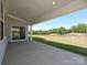 Covered patio offers outdoor living space and scenic backyard views at 2204 Camber Dr # Cwo0076, Gastonia, NC 28054