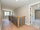 Hallway with hardwood floors, a staircase, and an open doorway at 2204 Camber Dr # Cwo0076, Gastonia, NC 28054