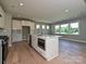 Kitchen island with stainless steel appliances and hardwood floors at 2204 Camber Dr # Cwo0076, Gastonia, NC 28054