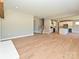 Spacious living room featuring hardwood flooring, a fireplace, and an open floor plan with lots of light at 2204 Camber Dr # Cwo0076, Gastonia, NC 28054