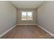 Room with neutral colors, hardwood flooring and a window providing natural light at 2204 Camber Dr # Cwo0076, Gastonia, NC 28054