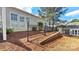 Rear yard with deck, metal fence and level lot at 3008 Sweetleaf Dr, Fort Mill, SC 29707