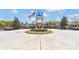 Circular drive at Sun City Carolina Lakes clubhouse with American and SC state flags at 3008 Sweetleaf Dr, Fort Mill, SC 29707