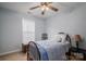 Cozy bedroom with a full bed, wood furniture and natural light at 3248 St Vincent Dr, Claremont, NC 28610