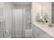Clean bathroom with a shower-tub combo, white vanity, and modern fixtures at 330 Malvern Sw Ave # A, Concord, NC 28025
