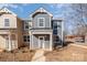 Attractive two-story home featuring a cozy porch and neat landscaping at 330 Malvern Sw Ave # A, Concord, NC 28025