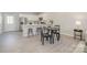 Modern kitchen featuring a breakfast bar, stainless steel appliances, and hardwood floors at 330 Malvern Sw Ave # A, Concord, NC 28025