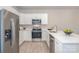 Open concept kitchen with modern appliances and white countertops at 330 Malvern Sw Ave # A, Concord, NC 28025