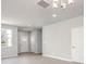 Open-concept living room with wood-look flooring, recessed lighting, and neutral paint at 330 Malvern Sw Ave # A, Concord, NC 28025