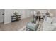 Spacious living area showcasing hardwood floors, a stylish kitchen, and modern decor at 330 Malvern Sw Ave # A, Concord, NC 28025