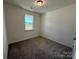Bedroom featuring neutral paint, carpet flooring, and one window at 334 Knotty Wood Dr # 68, Monroe, NC 28110