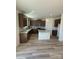 Modern kitchen featuring granite countertops, stainless steel appliances, and a functional center island at 334 Knotty Wood Dr # 68, Monroe, NC 28110