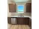 Well-lit kitchen showcasing modern cabinets, granite countertops, and stainless steel appliances at 334 Knotty Wood Dr # 68, Monroe, NC 28110