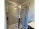 Glass shower with tiled walls and built-in niche is sleek and modern at 334 Knotty Wood Dr # 68, Monroe, NC 28110