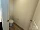 Half-bathroom with toilet and door at 334 Knotty Wood Dr # 68, Monroe, NC 28110