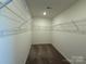 A walk-in closet featuring ample shelving is perfect for home organization at 334 Knotty Wood Dr # 68, Monroe, NC 28110