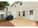 Enclosed patio with access to the house; features two exterior doors and a large outdoor grill at 446 Clouds Way Way, Rock Hill, SC 29732