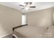 A bedroom with a ceiling fan, neutral walls, and carpet flooring at 446 Clouds Way Way, Rock Hill, SC 29732