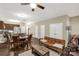 Open living area with dining area and kitchen featuring a large sofa and hardwood floors at 446 Clouds Way Way, Rock Hill, SC 29732