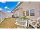 Enclosed backyard featuring a patio area, comfortable seating, and a well-maintained fence at 4708 Tradd Cir, Monroe, NC 28110