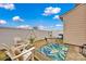 Backyard space with outdoor seating, a stylish rug, and a neat fence under a bright sky at 4708 Tradd Cir, Monroe, NC 28110