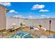 Private backyard with a patio set, a patterned rug, and a charming white picket fence under a sunny sky at 4708 Tradd Cir, Monroe, NC 28110