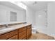 Spacious bathroom featuring double sink vanity, ample storage, and a shower/tub combination at 4708 Tradd Cir, Monroe, NC 28110