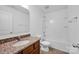 Bathroom with granite countertop vanity, tiled floors, toilet, and a shower/tub combination at 4708 Tradd Cir, Monroe, NC 28110