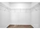 Spacious walk-in closet with a wire shelving system ready for organizing clothes and accessories at 4708 Tradd Cir, Monroe, NC 28110