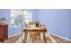Bright office featuring a modern desk setup with chair and neutral carpet at 4708 Tradd Cir, Monroe, NC 28110