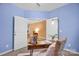 Bright home office featuring neutral walls, wood floors, and office setup at 4708 Tradd Cir, Monroe, NC 28110