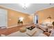 Comfortable living room featuring wood floors, with a view of the entry hall at 4708 Tradd Cir, Monroe, NC 28110