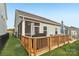 Exterior of home features a screened in porch, wooden deck and backyard at 50143 Robins Nest Ln, Lancaster, SC 29720