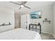 Spacious bedroom with a ceiling fan, television, and ample storage, designed for comfort and convenience at 50143 Robins Nest Ln, Lancaster, SC 29720