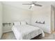 Well-lit bedroom featuring a ceiling fan and minimalist decor, offering a serene and uncluttered space at 50143 Robins Nest Ln, Lancaster, SC 29720